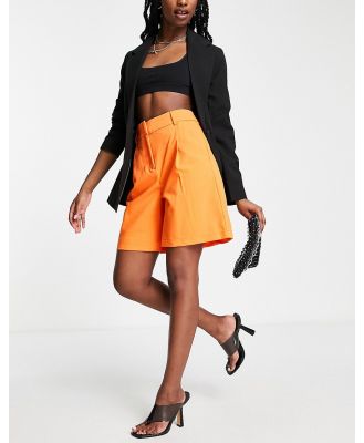 Vero Moda tailored city suit shorts in bright orange