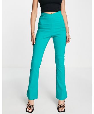 Vesper dipped waist flared pants in turquoise-Green