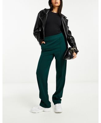 Vila stretch wide leg pants with pin tuck front in dark green