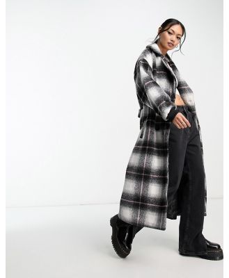 Violet Romance belted trench coat in black and white check