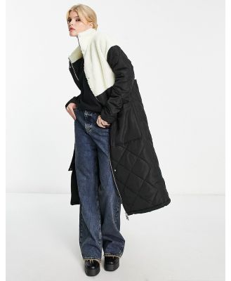 Violet Romance quilted longline coat with borg contrast in black