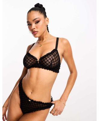 We Are We Wear flock mesh unlined bralet with ruffle trim detail in black