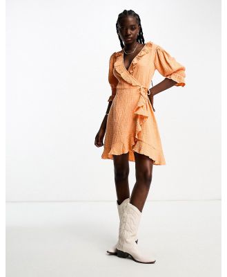 Wednesday's Girl gauzy ruffle wrap mini dress in washed orange