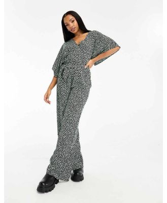 Wednesday's Girl v-neck wide sleeve belted jumpsuit in green spot