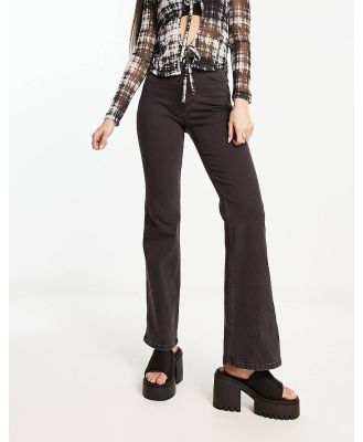 Weekday Glow high waist flared stretch jeans in black lux