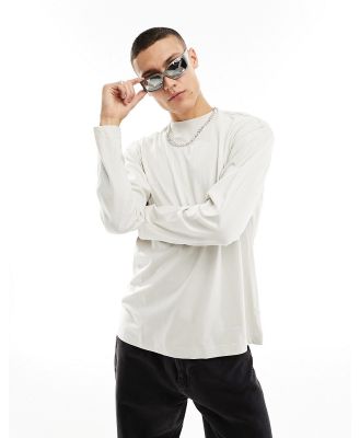 Weekday relaxed mock neck long sleeve t-shirt in light beige-Neutral