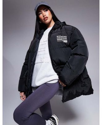 Weekend Collective waisted padded coat with logo in black