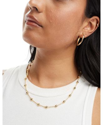 Whistles beaded T bar necklace in gold