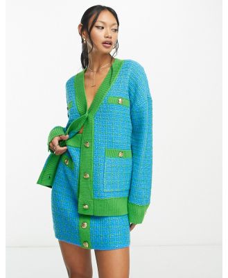 Y.A.S boucle button through mini skirt in blue and green check