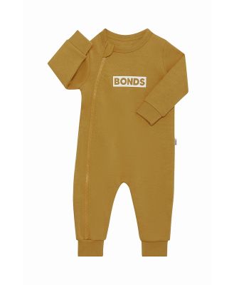 Bonds Tech Sweats Zip Wondersuit in Sweet Caramel Size: